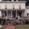 View of the house in 1987: visible stonework, no shutters. Photo: Elena Dondero.
